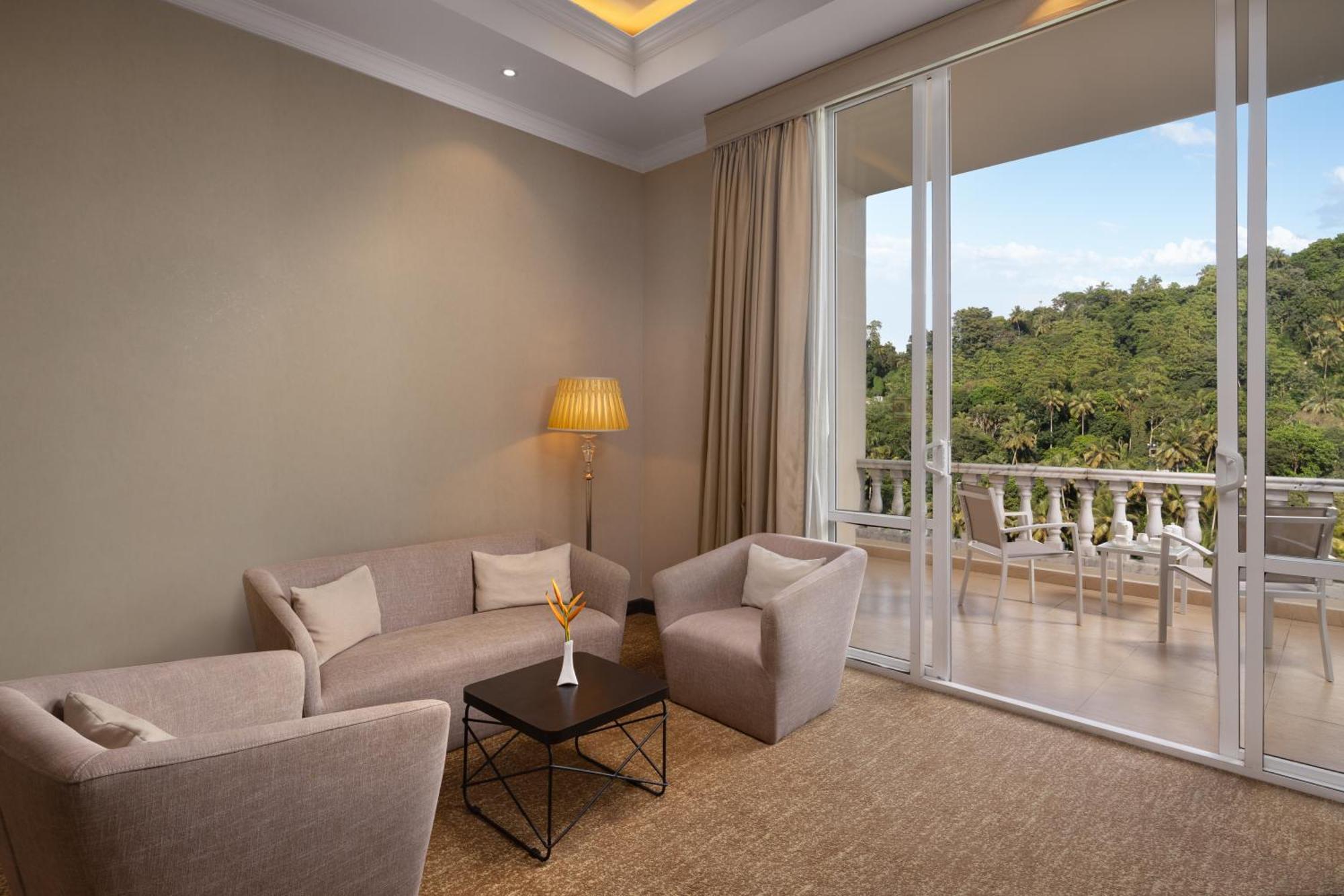 The Golden Crown Hotel Kandy Exterior foto A living room in a suite at the Shangri-La Hotel, Kuala Lumpur